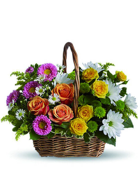 Cesto di rose gialle, arancio e margherite